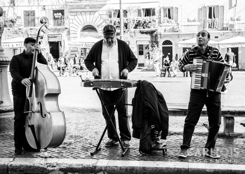 Man playing their instruments Rome, Italy